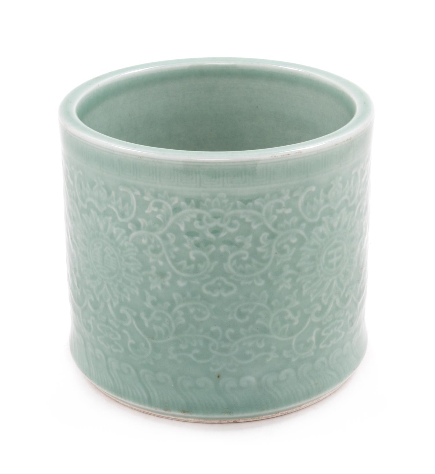 A Celadon Porcelain Brushpot Height 6 1/2 inches.