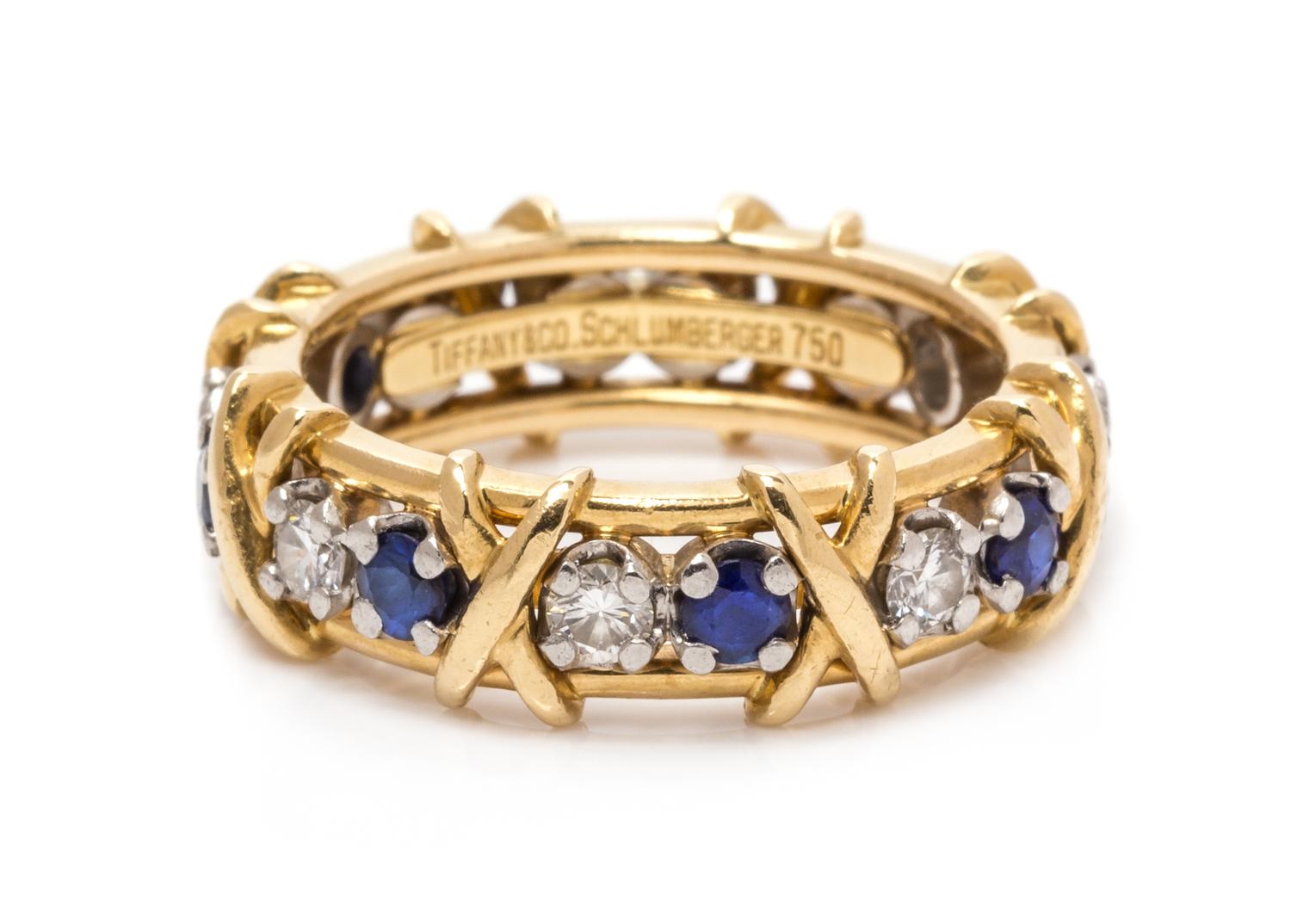 An 18 Karat Yellow Gold, Platinum, Diamond and Sapphire 'Sixteen Stone' Ring, Schlumberger for Tiffany & Co., 5.70 dwts.