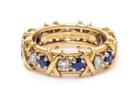 An 18 Karat Yellow Gold, Platinum, Diamond and Sapphire 'Sixteen Stone' Ring, Schlumberger for Tiffany & Co., 5.70 dwts.