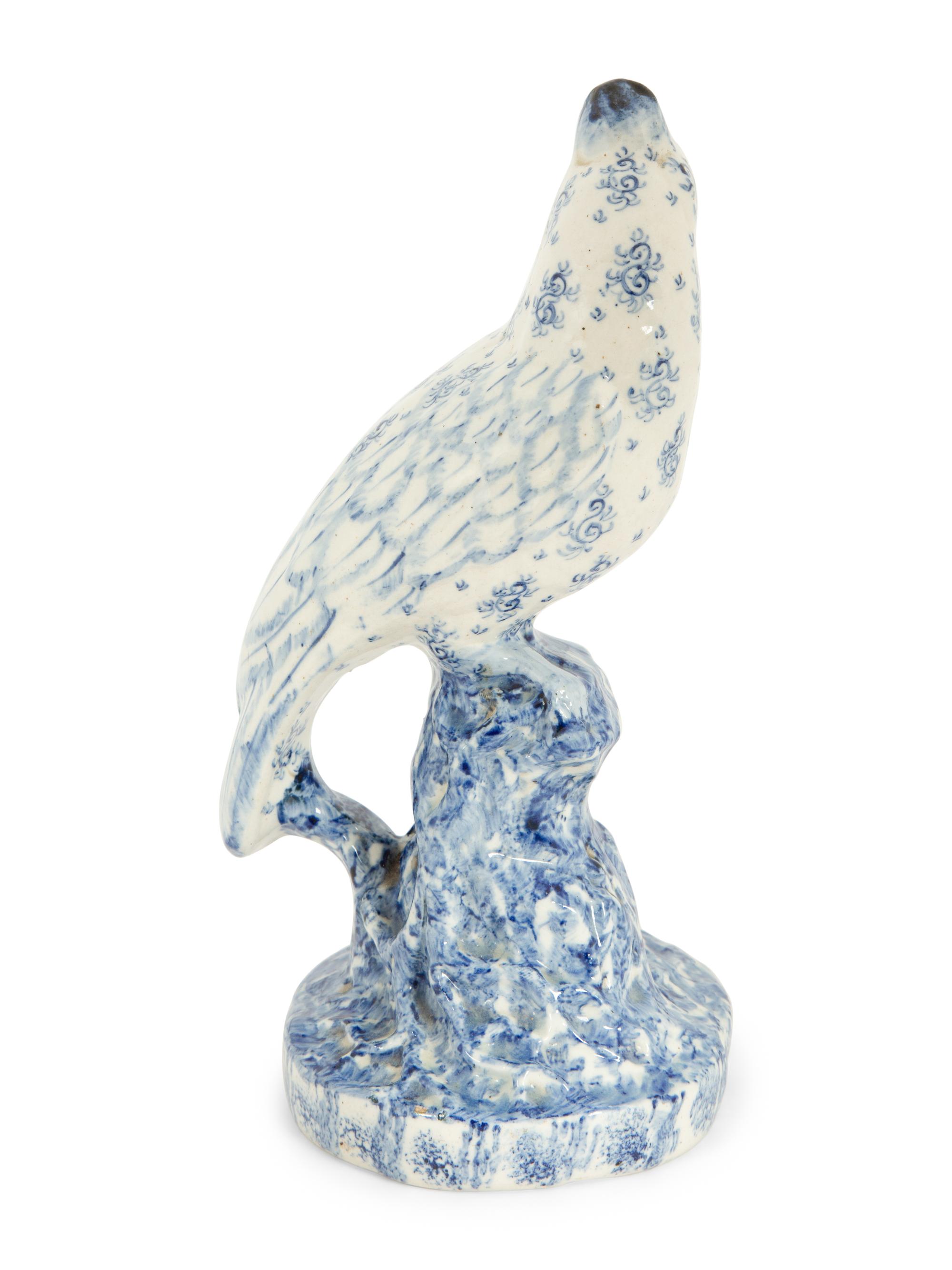 A Blue and White Spongeware Model of a Parrot