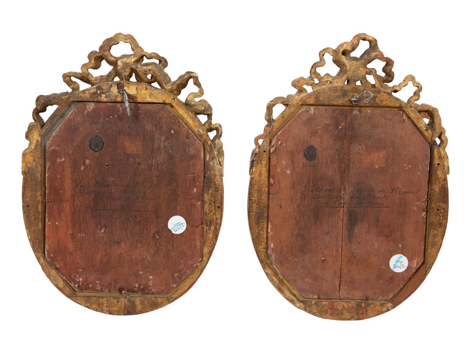 A Pair of Giltwood Framed Ebonized Relief Portrait Plaques of French Nobility, 18th Century