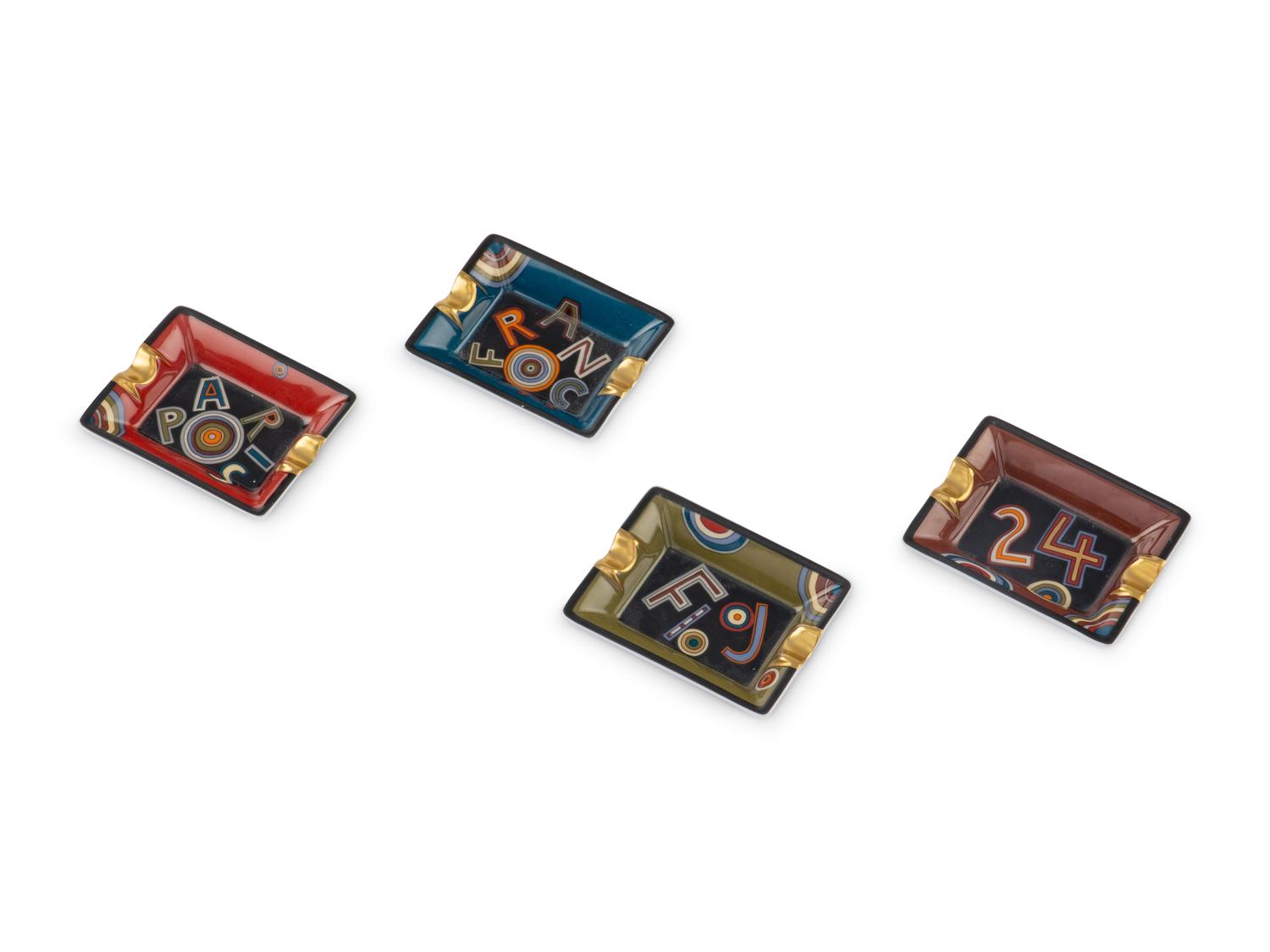A Set of Four Hermès Porcelain Ashtrays