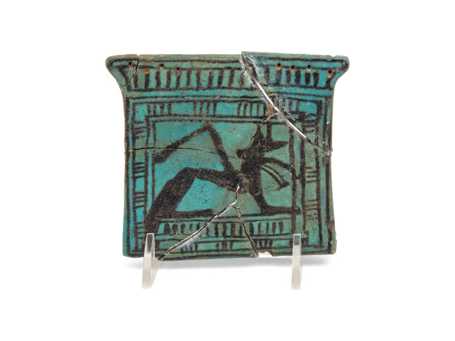 An Egyptian Faience Pectoral with Anubis