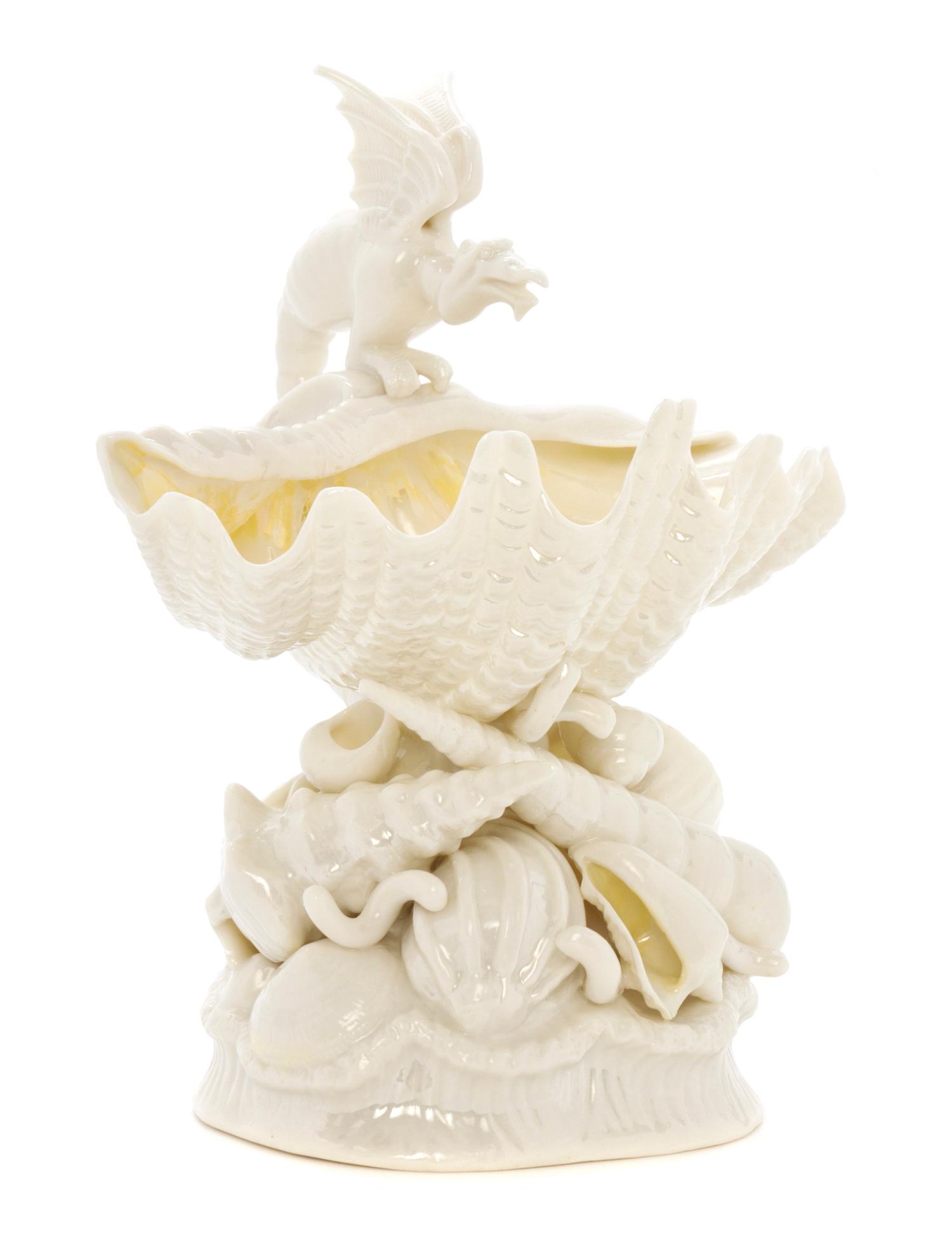 A Belleek Clam Shell and Griffin, Height 7 1/4 inches.