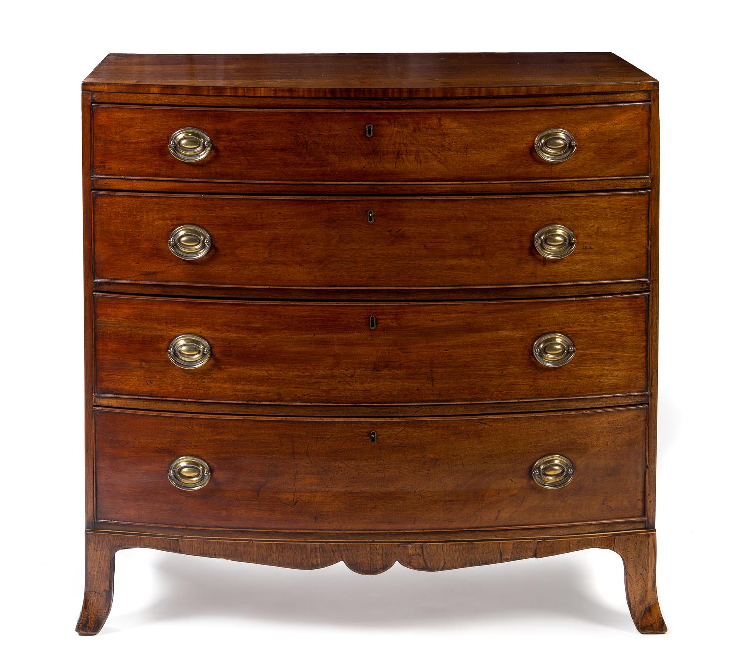 A George III Mahogany Bowfront Chest of Drawers Height 40 1/2 x width 41 1/2 x depth 21 3/4 inches.