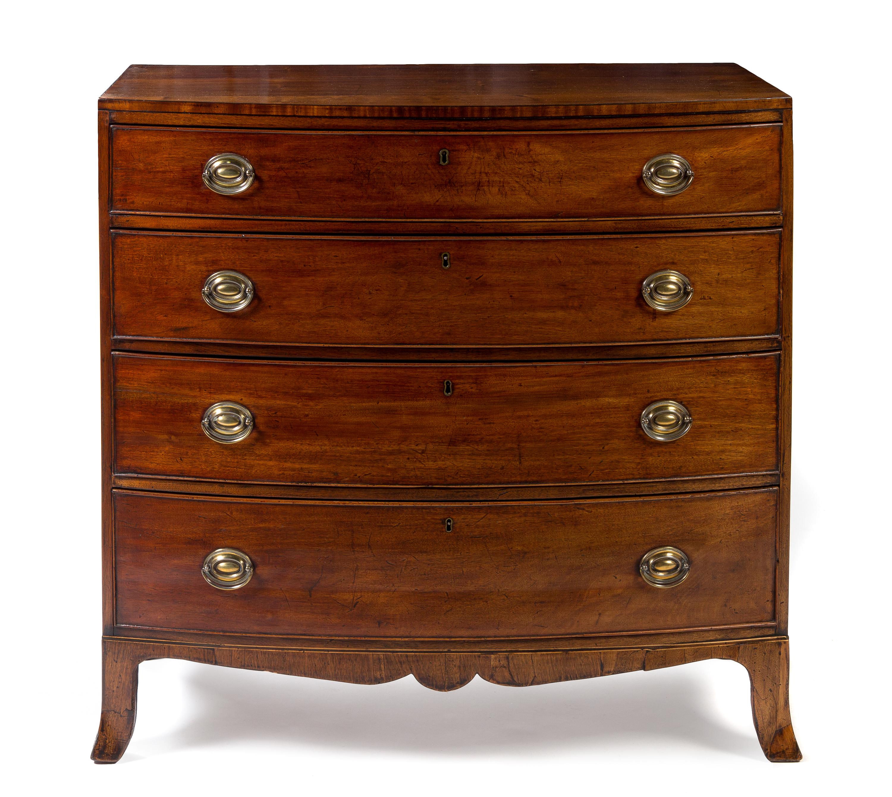 A George III Mahogany Bowfront Chest of Drawers Height 40 1/2 x width 41 1/2 x depth 21 3/4 inches.