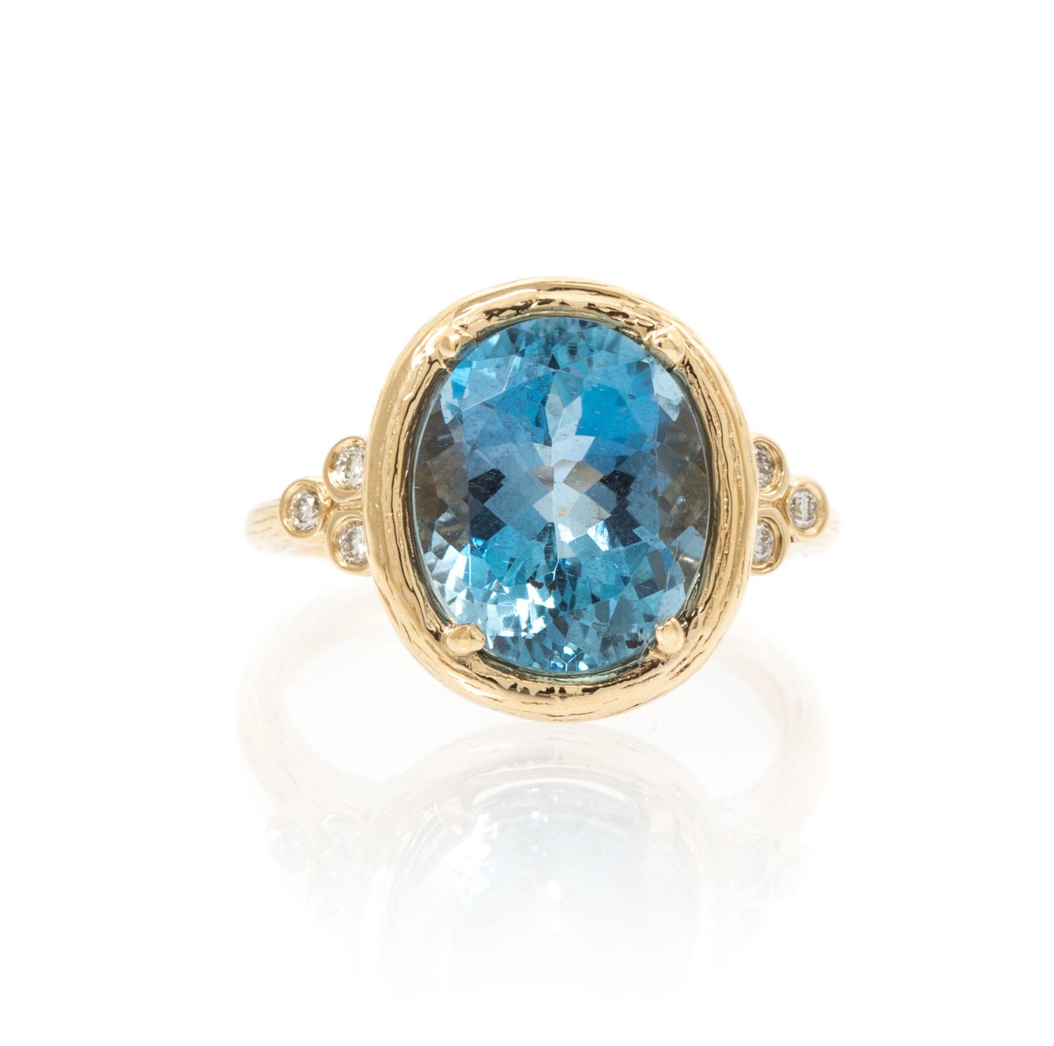 A 14 Karat White Gold, Aquamarine and Diamond Ring, 3.30 dwts.