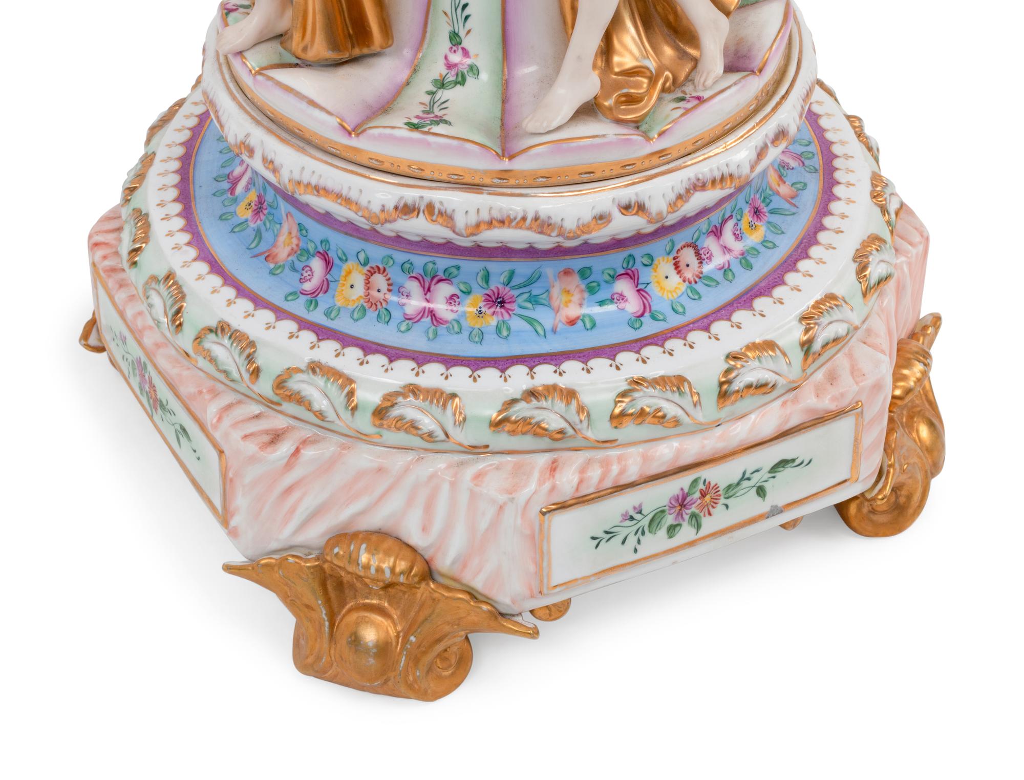 A Large German Porcelain Figural Centerpiece