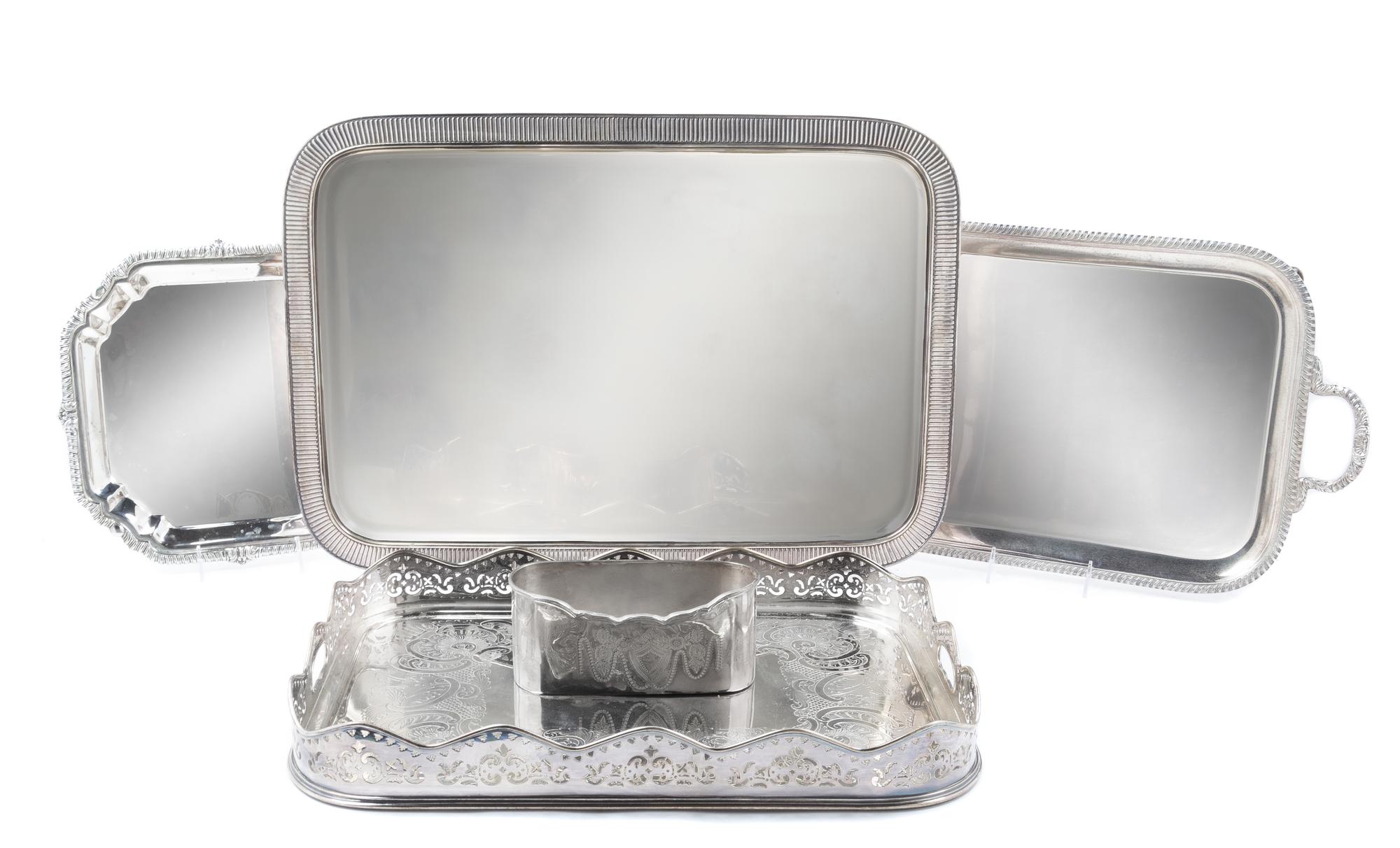 Four Silver-Plate Trays Width of widest 23 1/2 inches.