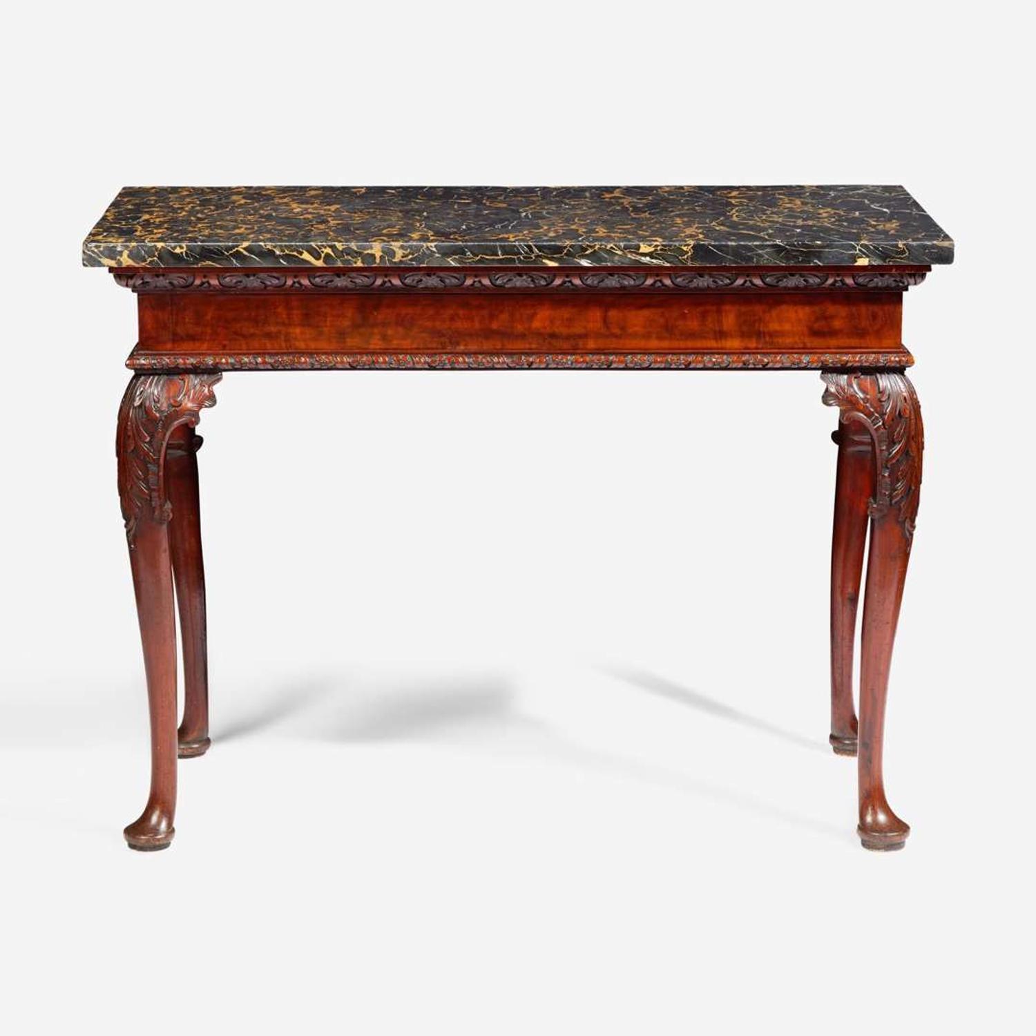 A George II rectangular carved walnut side table with Portoro marble top mid-18th century