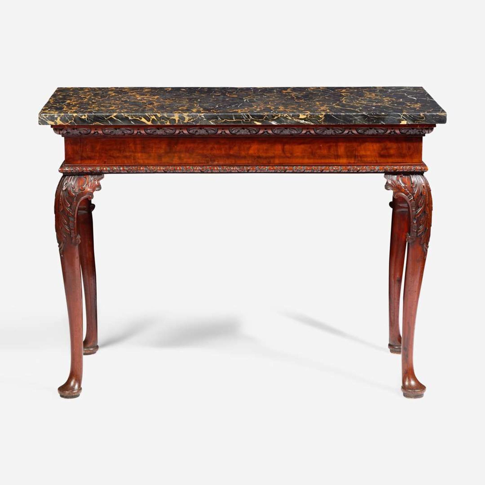 A George II rectangular carved walnut side table with Portoro marble top mid-18th century