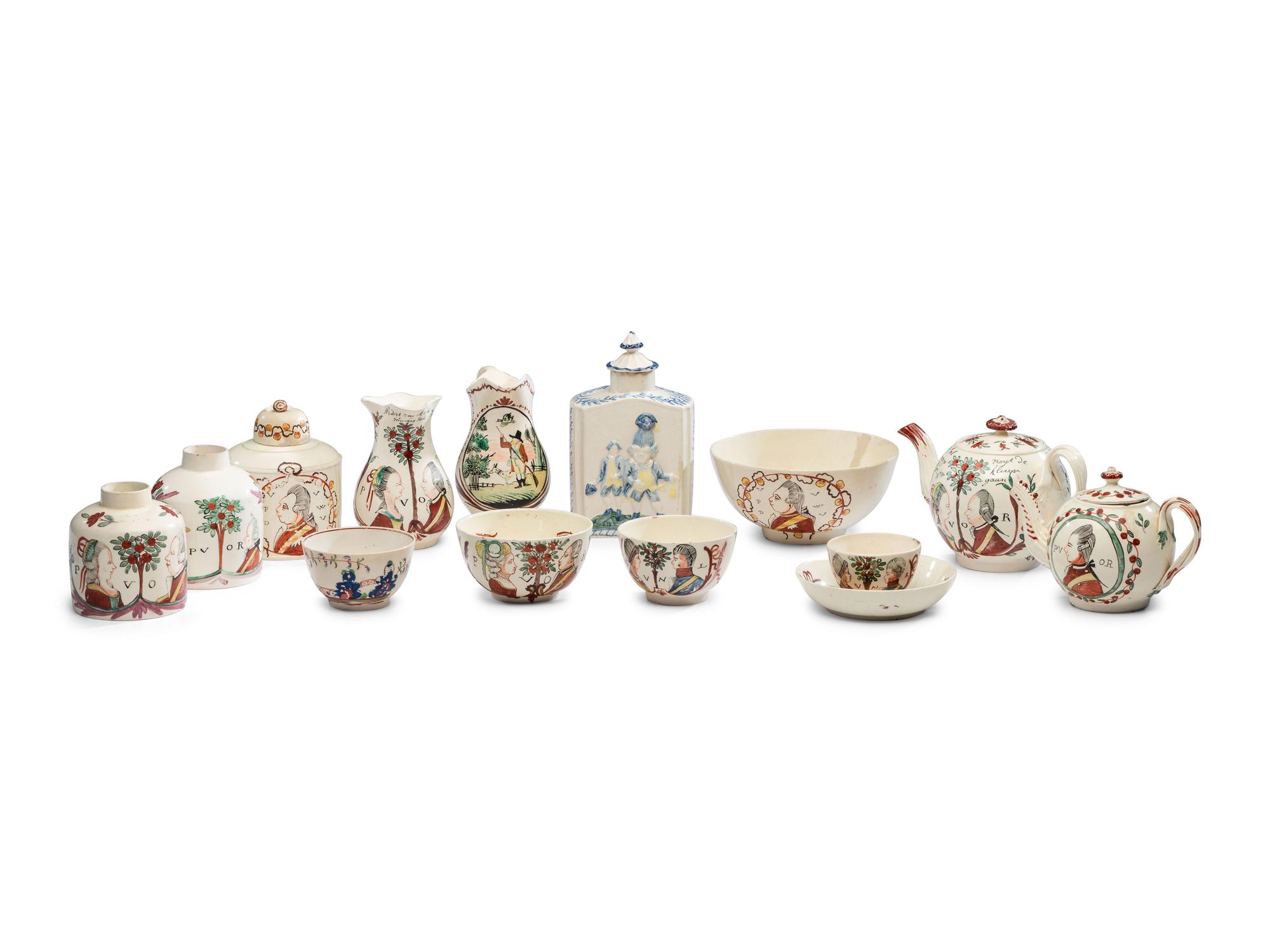 An Assembled Collection of English Creamware 'William of Orange' Table Articles