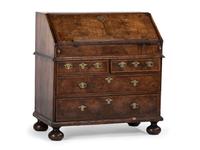 A William and Mary Style Figured Walnut Slant Front Desk