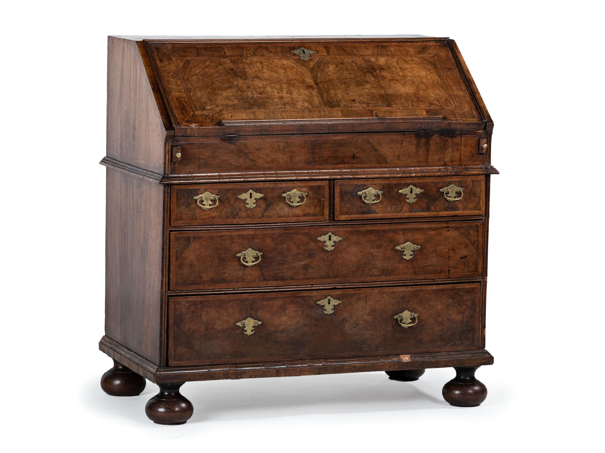 A William and Mary Style Figured Walnut Slant Front Desk