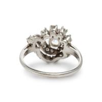 Diamond and White Gold Swirl Ring
