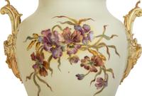A Rudolstadt Painted and Parcel Gilt Porcelain Lidded Urn