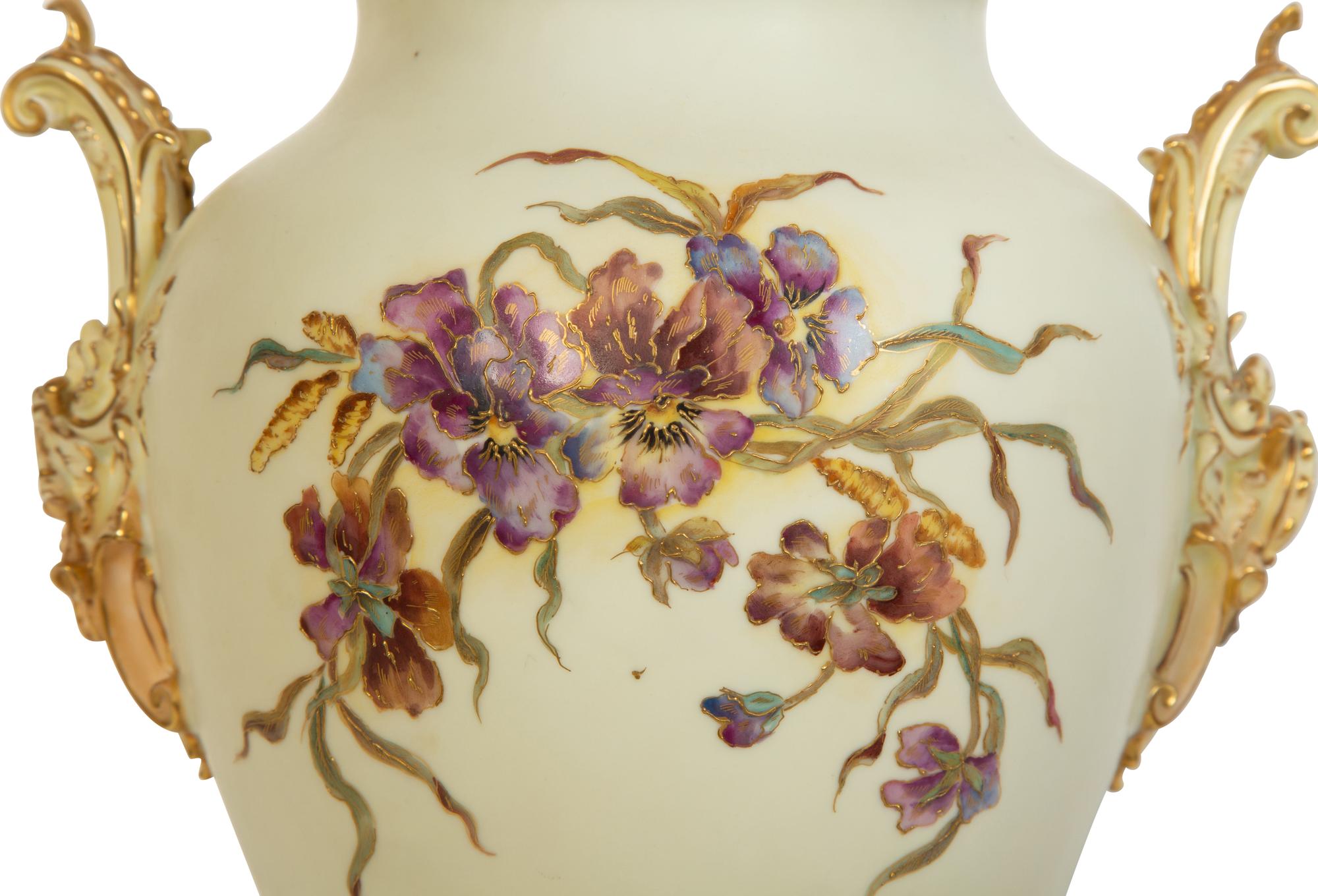 A Rudolstadt Painted and Parcel Gilt Porcelain Lidded Urn