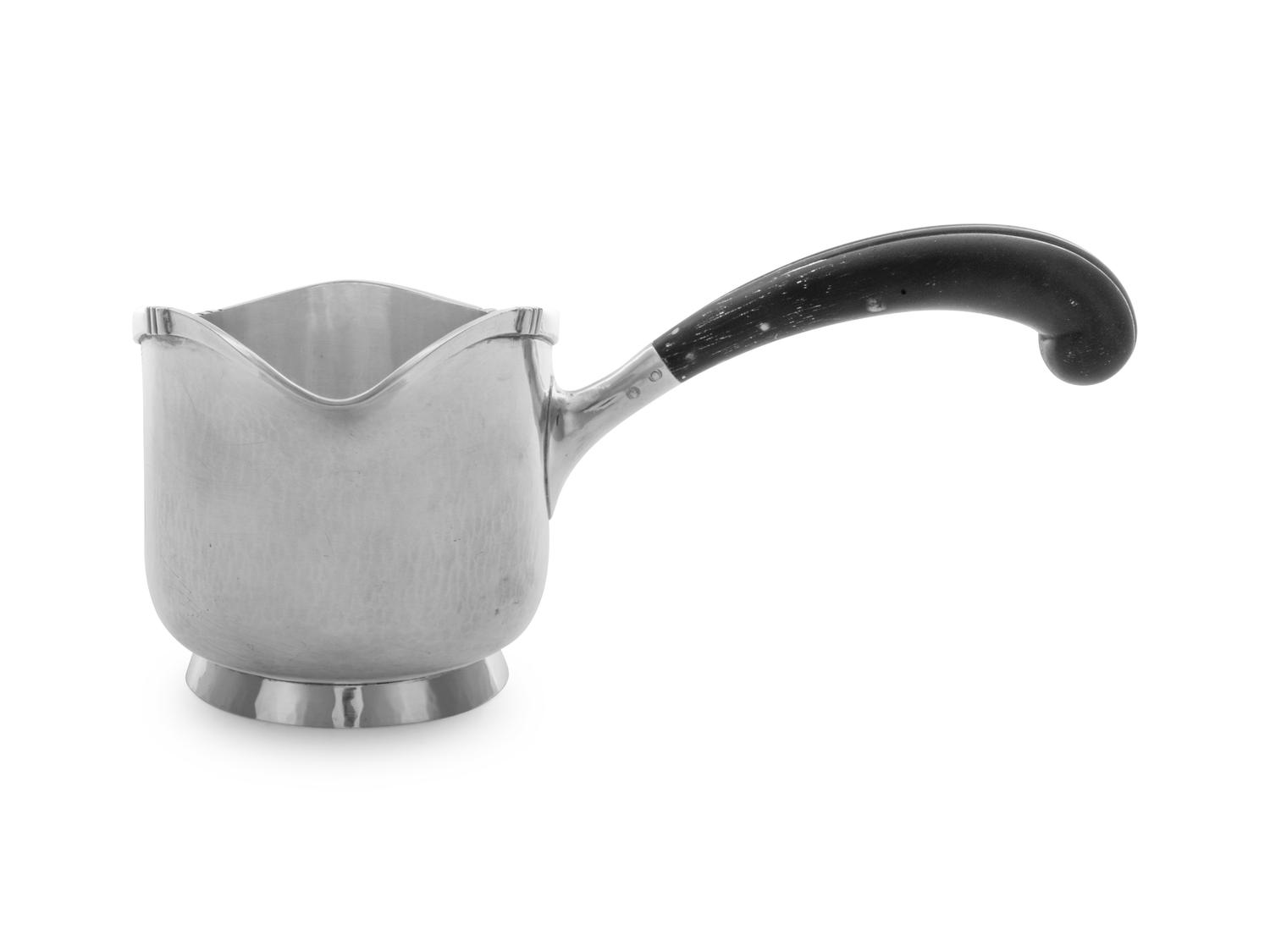 An American Arts and Crafts Silver Brandy Warmer