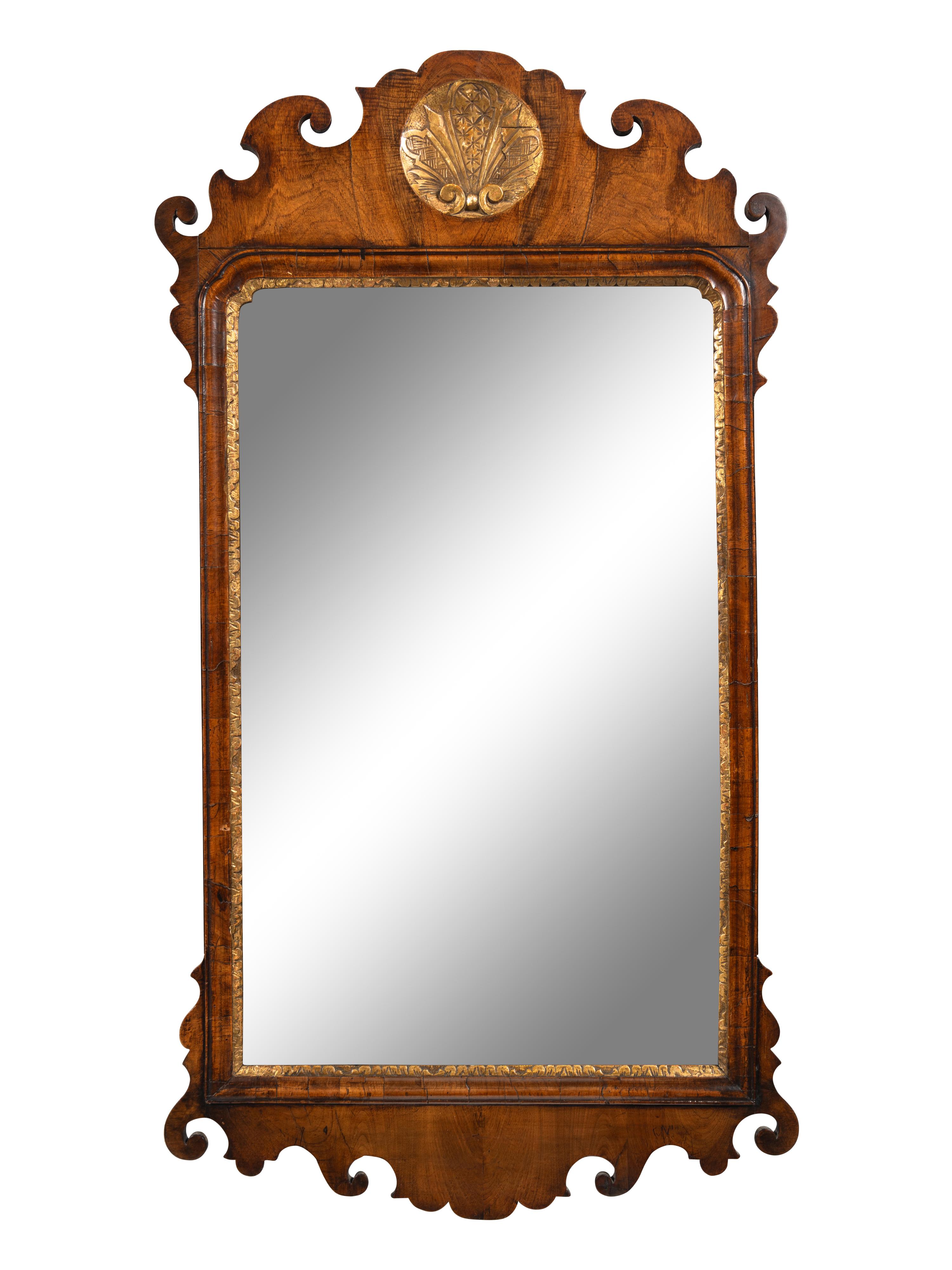 A George III Parcel-Gilt Mahogany Mirror