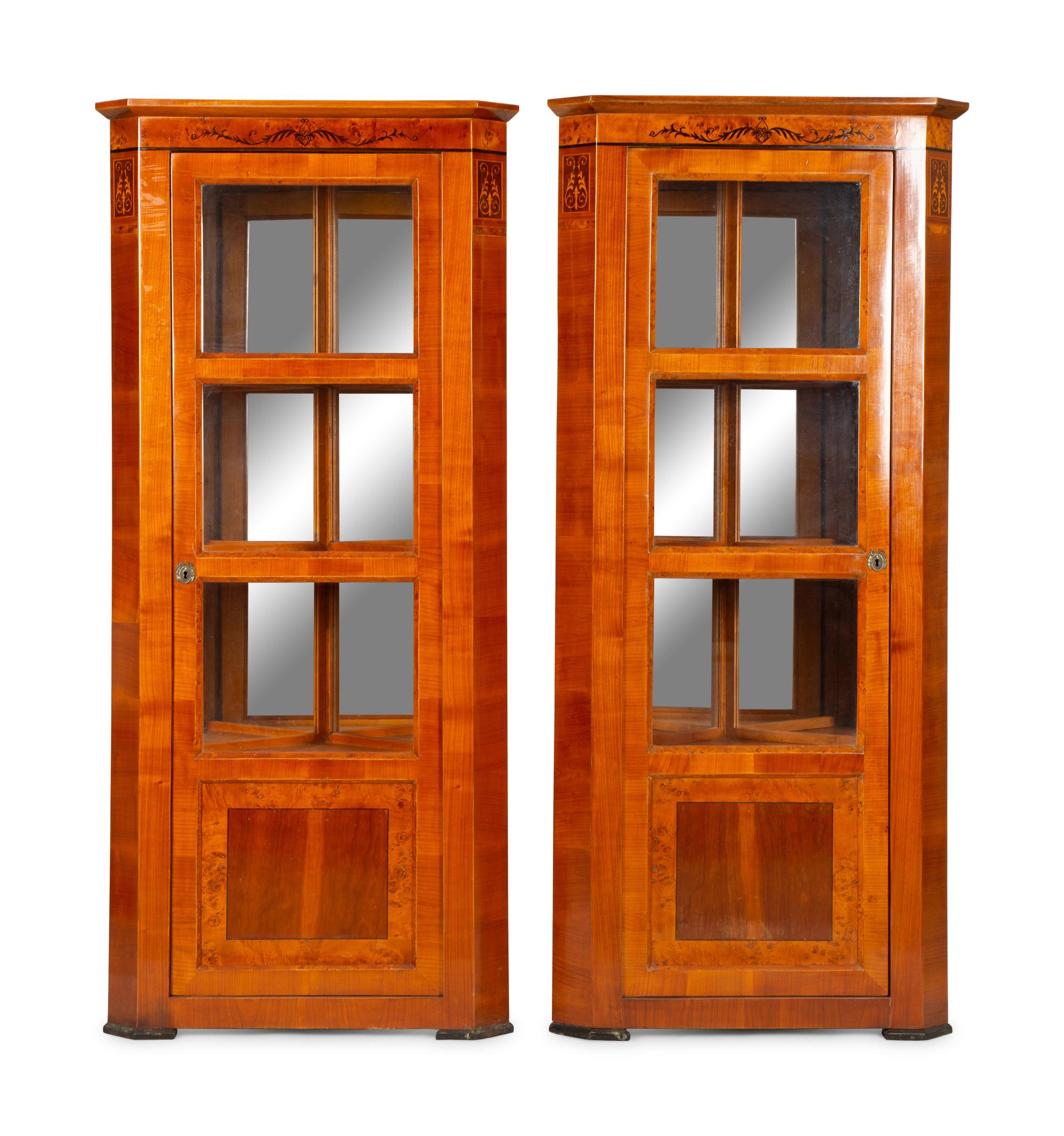 A Pair of Biedermeier Bird's Eye Maple and Walnut Corner Cabinets — Mid-19th Century