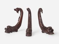 A group of three Classical carved mahogany dolphins, possibly Philadelphia, PA, circa 1820-1830