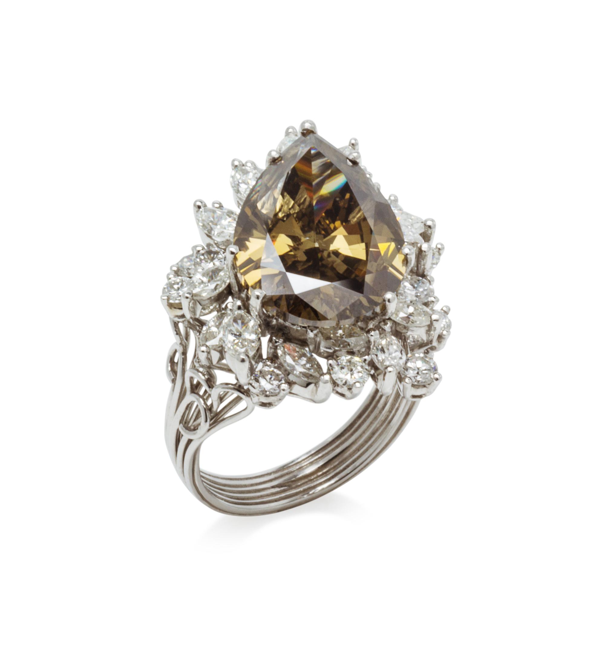 A Platinum, Fancy Colored Diamond and Diamond Ring, 10.20 dwts.