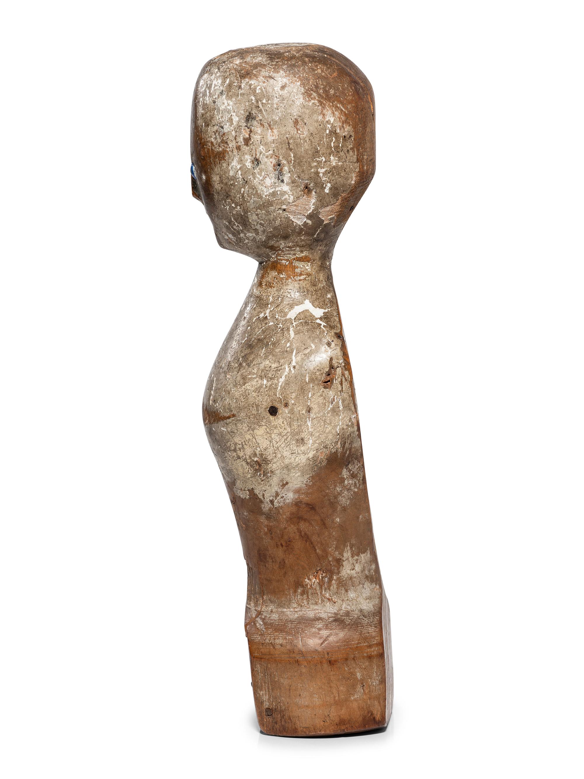 A Folk Art Carved, Painted and Glass Inset Wood Doll "Bed Post" Figure