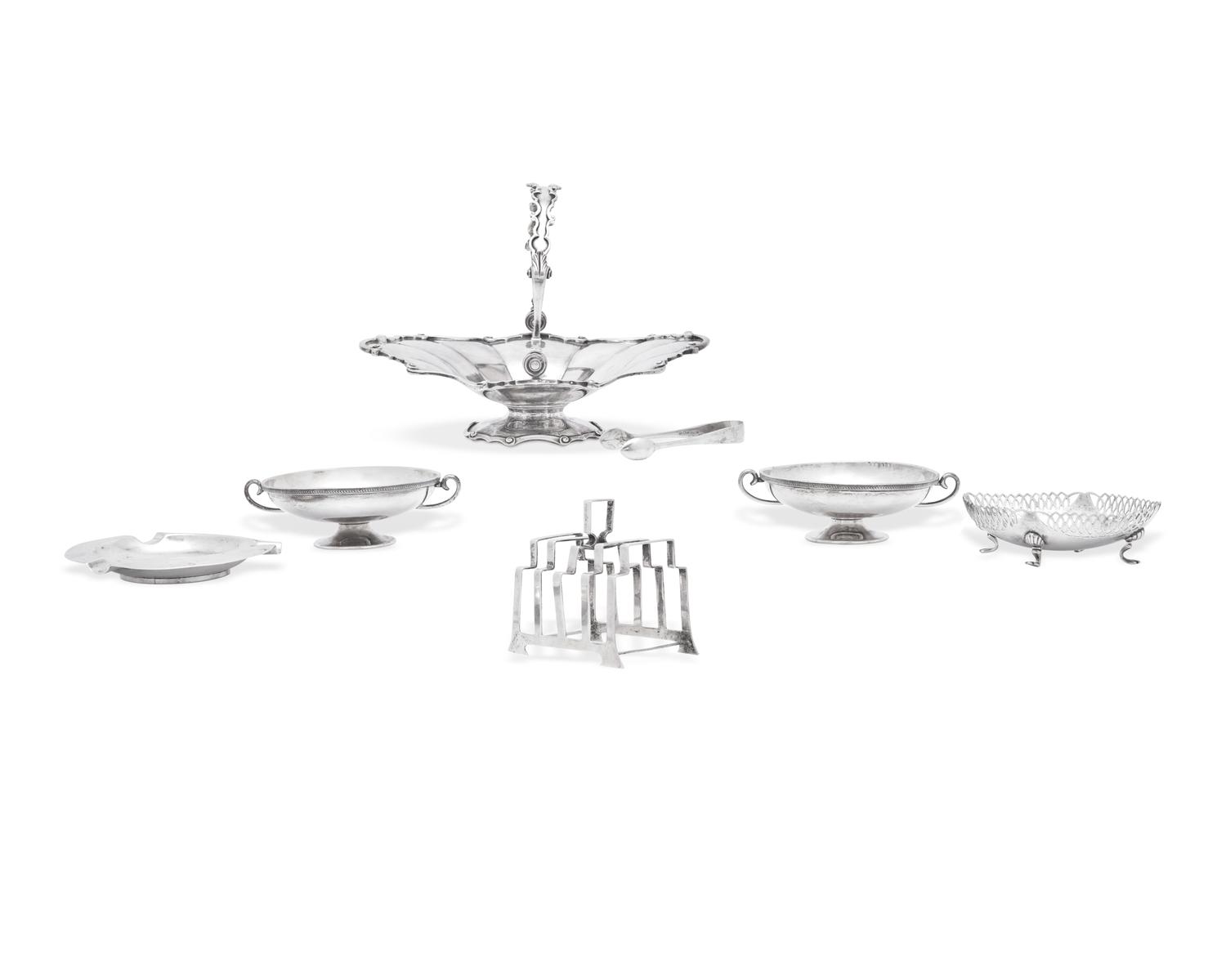 A Group of Seven English Silver Table Articles