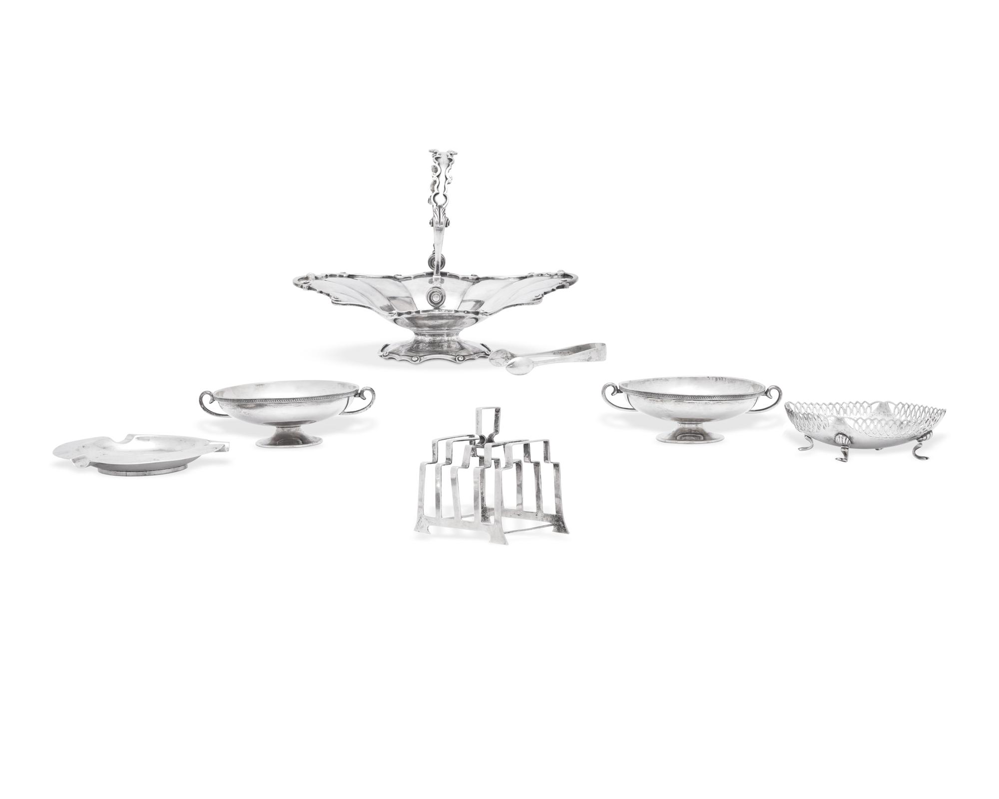 A Group of Seven English Silver Table Articles