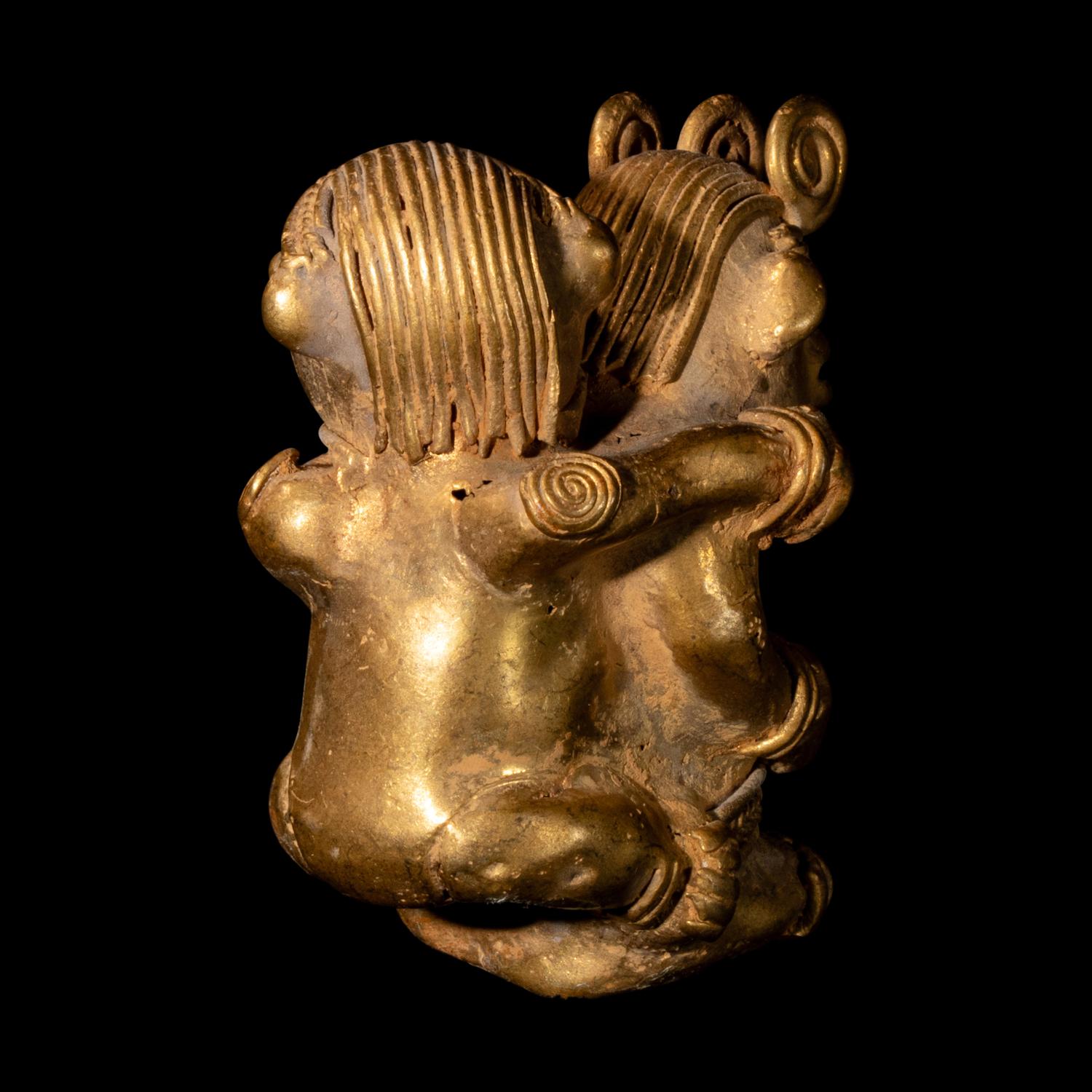 A Tairona Tumbaga Mother and Child Figure