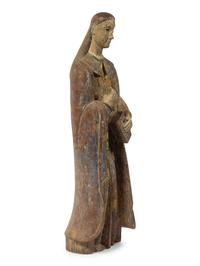 A Carved and Painted Figure of a Saint