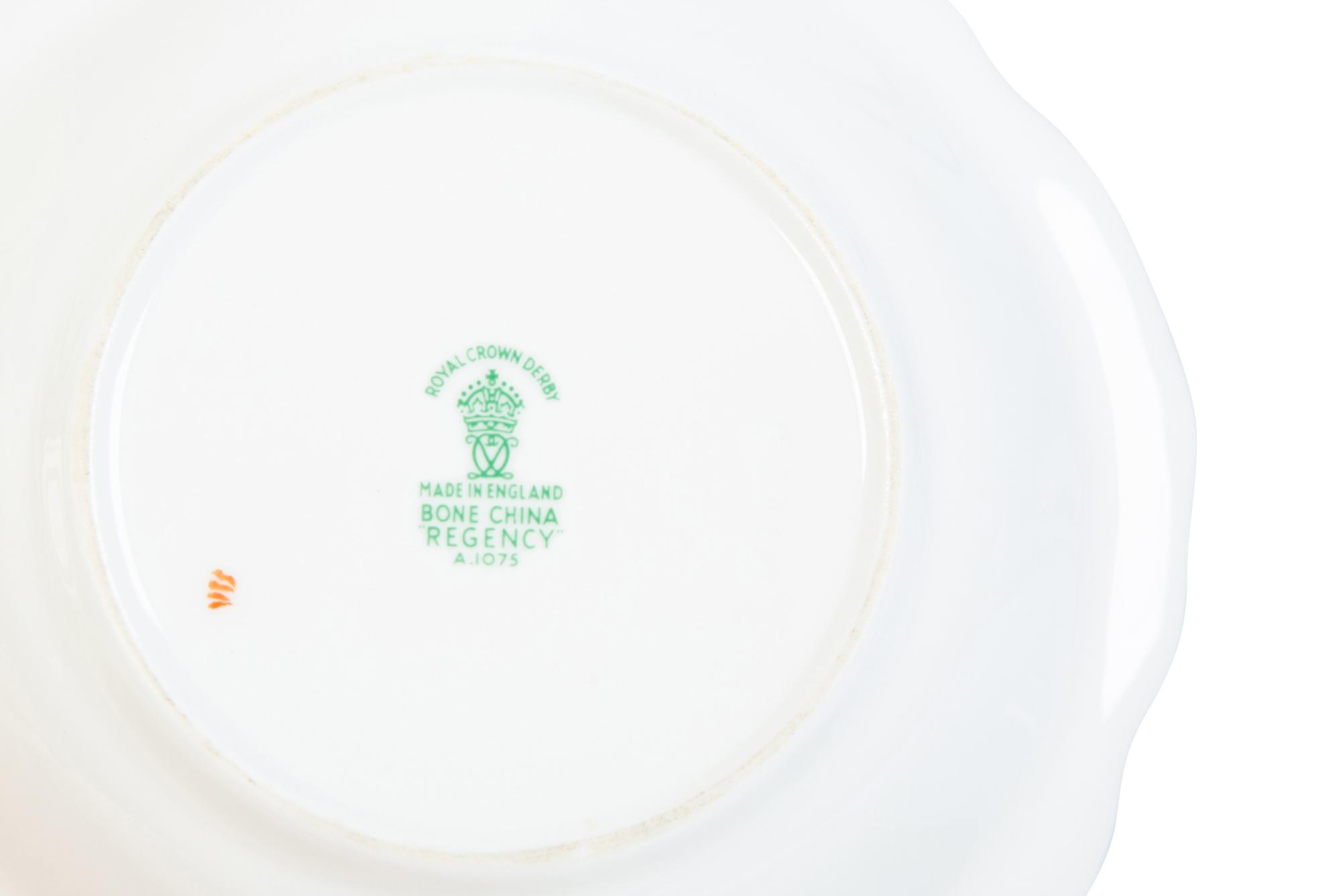 A Royal Crown Derby Porcelain Regency Pattern Dinner Service — 20TH CENTURY