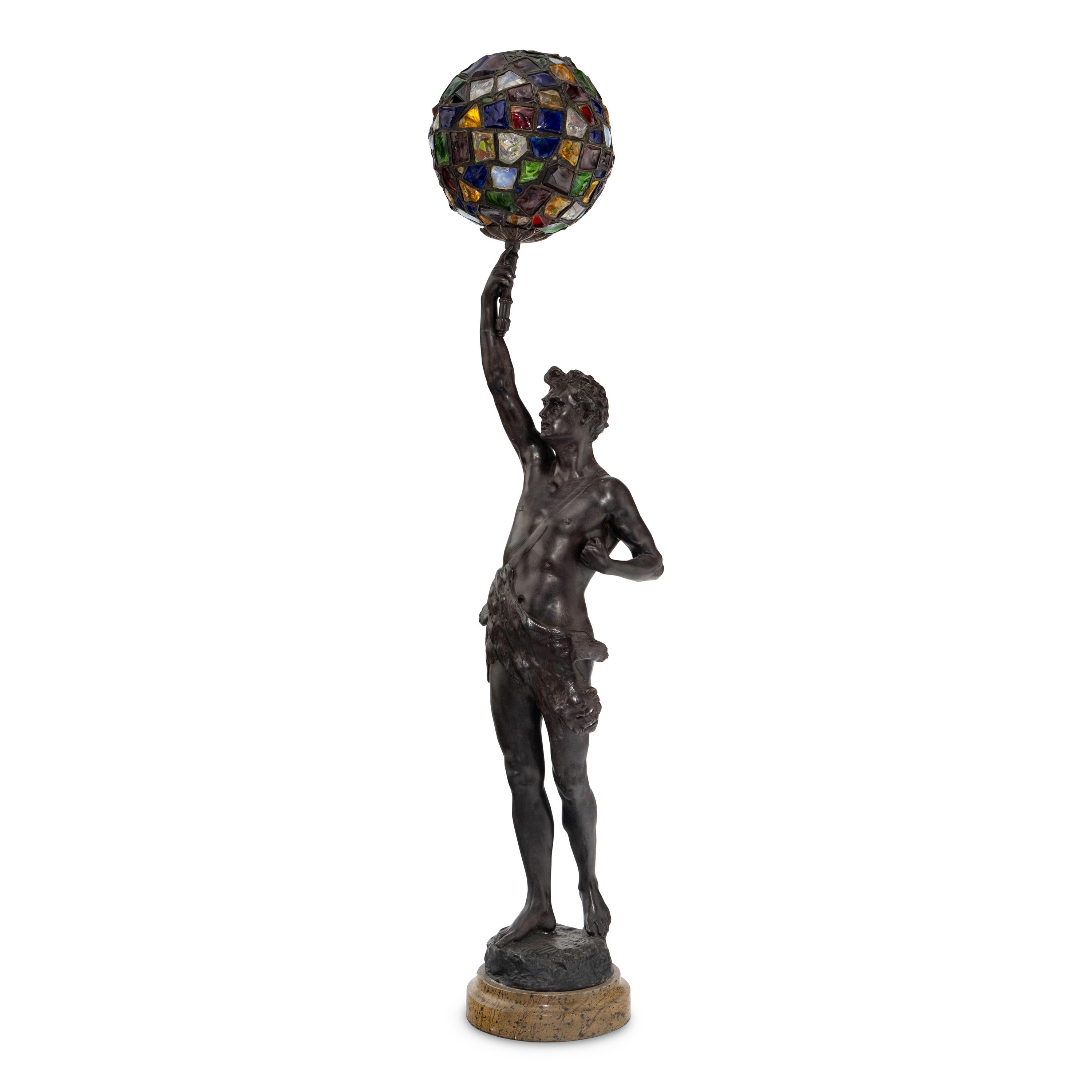 A French Cast Metal and Colored Glass Figural Lamp