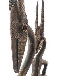 An African Wooden Figure with Bird Headdress