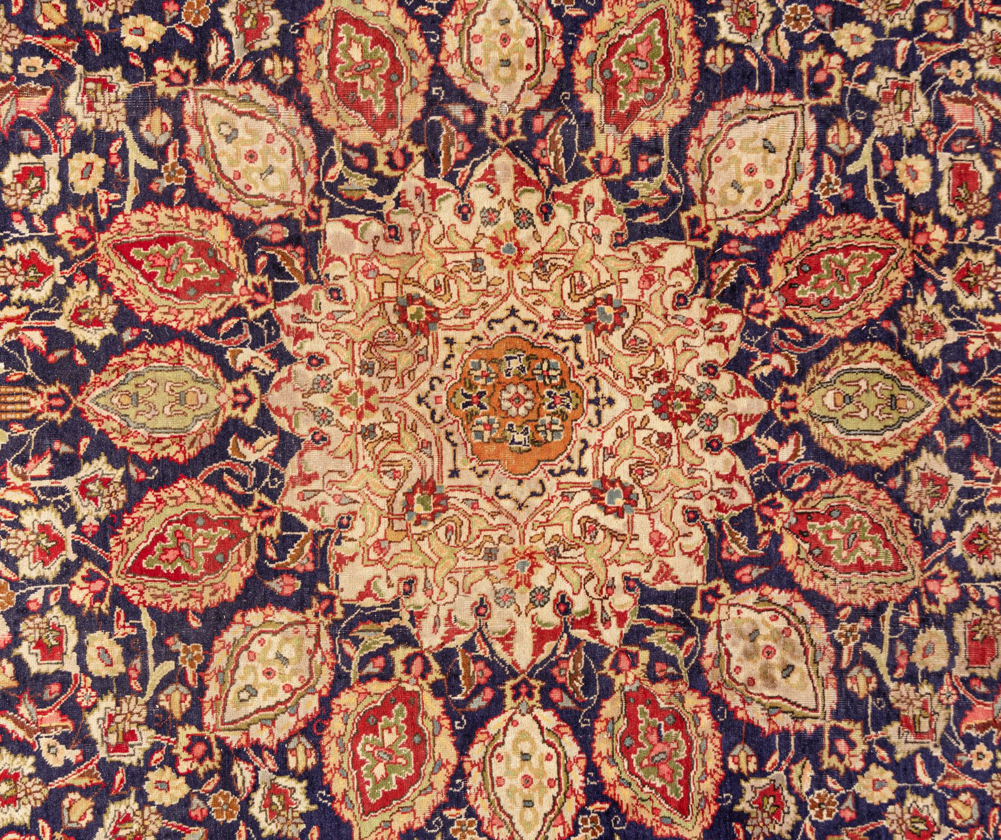 A Kashan Wool Rug