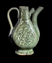 A Chinese Carved Longquan Celadon Glazed Porcelain Ewer