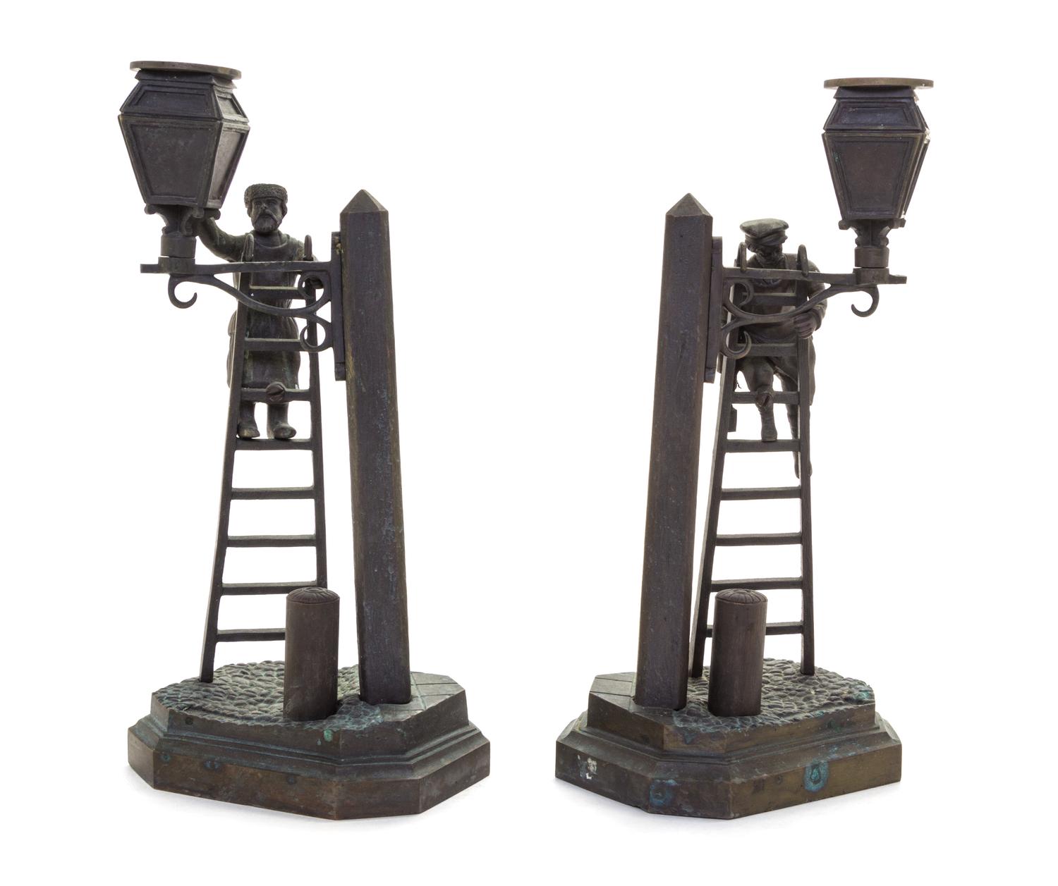 A Pair of Russian Bronze Figural Candlesticks Height 10 1/4 inches. — EVGENY IVANOVICH NAPS (19TH CENTURY)