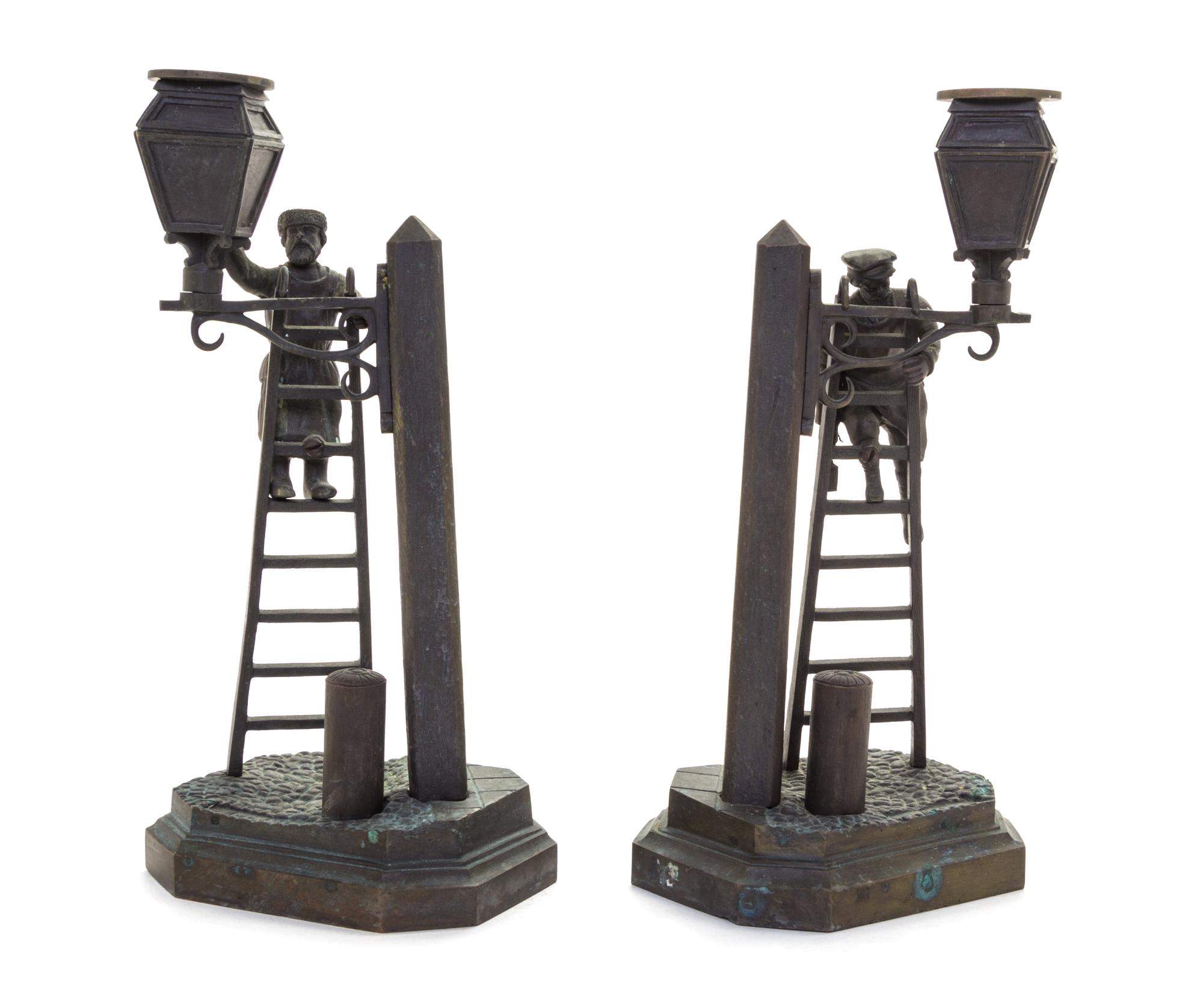 A Pair of Russian Bronze Figural Candlesticks Height 10 1/4 inches. — EVGENY IVANOVICH NAPS (19TH CENTURY)