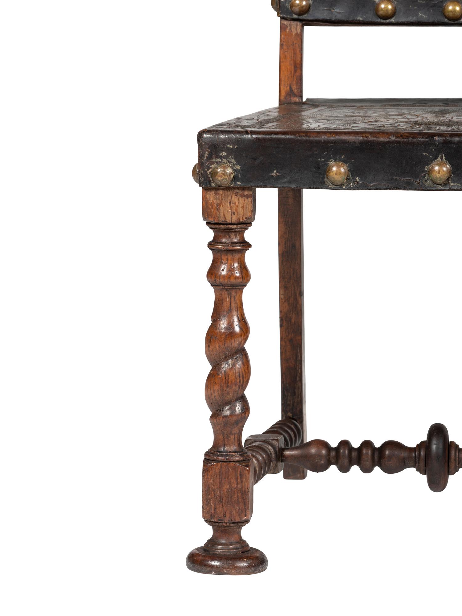 Six Mizner Carved Walnut and Embossed Leather Back Side Chairs