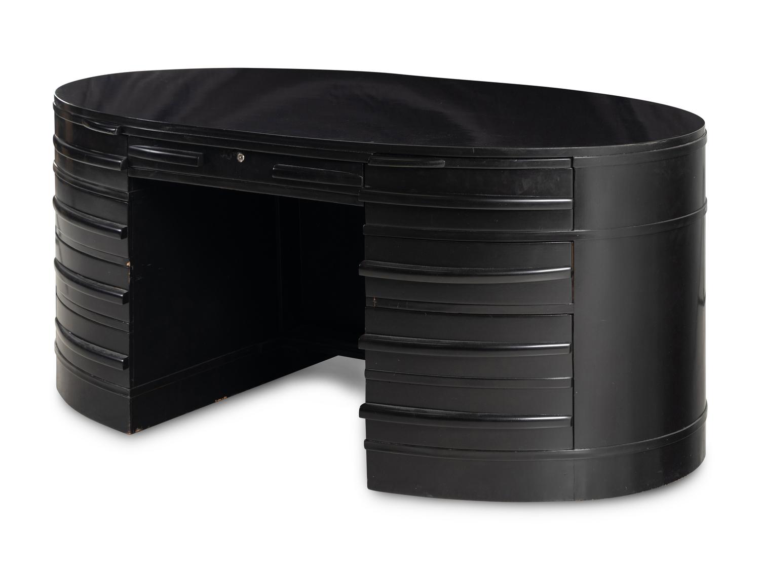 An Ebonized Oval Desk