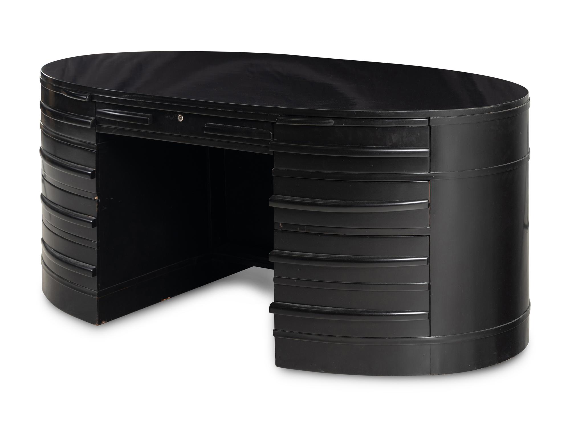 An Ebonized Oval Desk