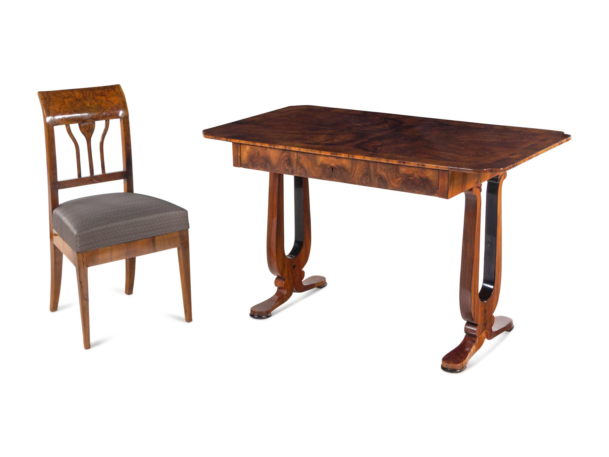 An Austrian Neoclassical Burlwood Writing Table and Chair