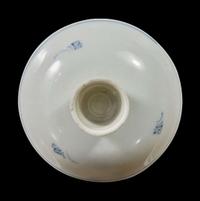 Seven assorted glass, porcelain snuff bottles; a vase; and a small blue and white porcelain tazza