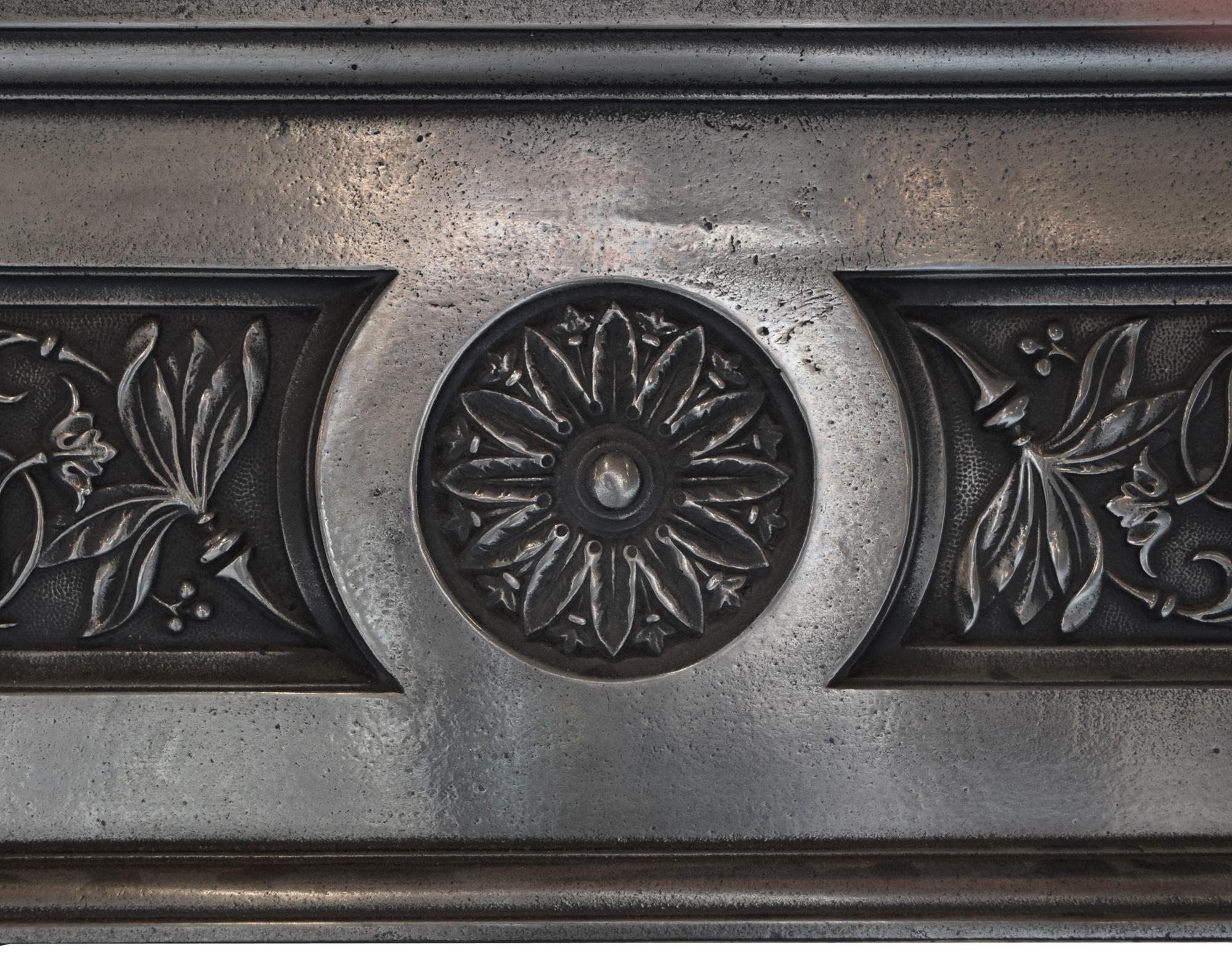 A Cast Iron Fireplace Mantel 58.5" W x 9" D x 53.5" H — England, Late 19th Century