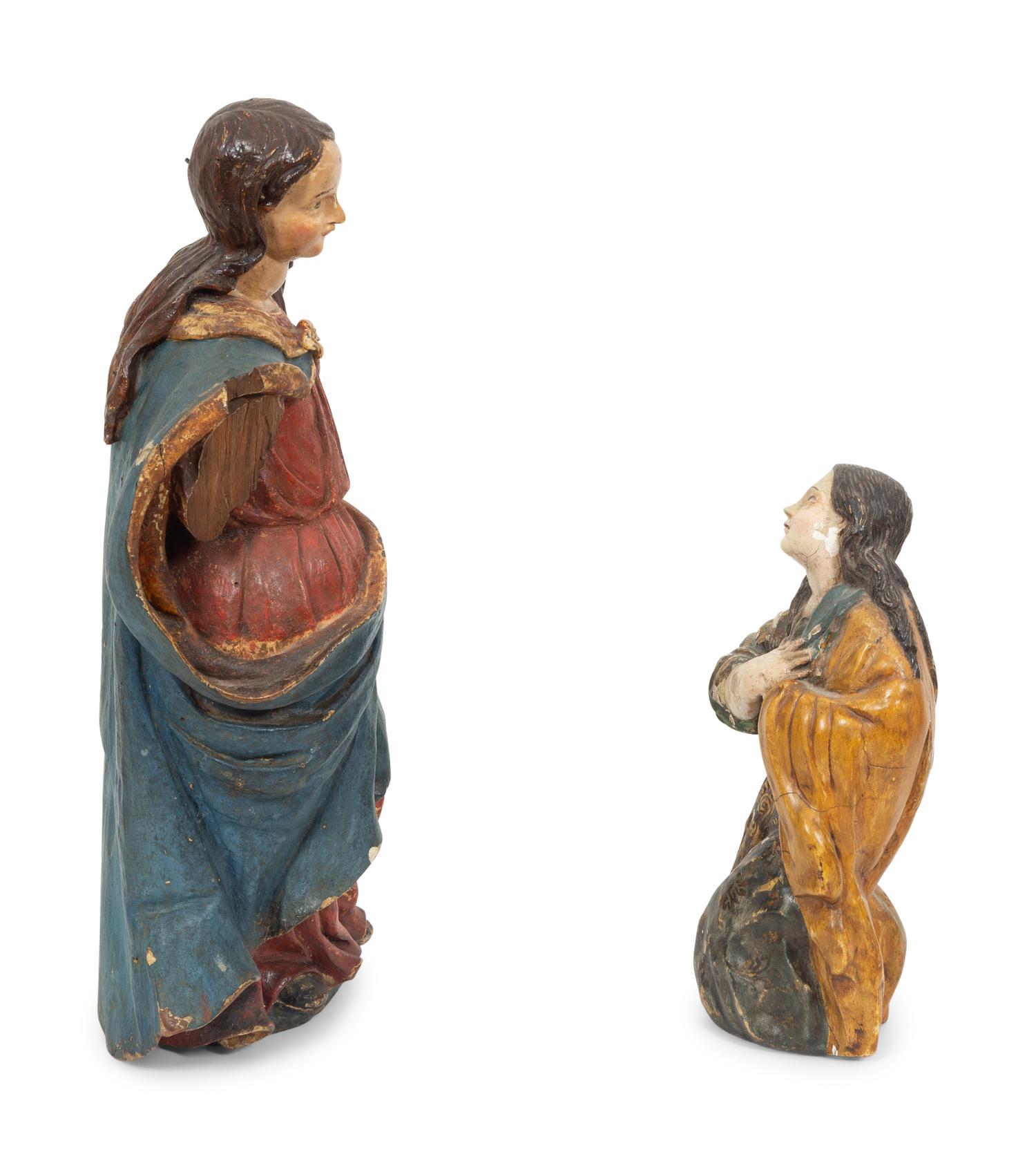Two Italian Polychromed and Gilt Santos Figures