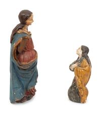 Two Italian Polychromed and Gilt Santos Figures