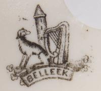 A Belleek Affection Figure, Height 14 1/2 inches.