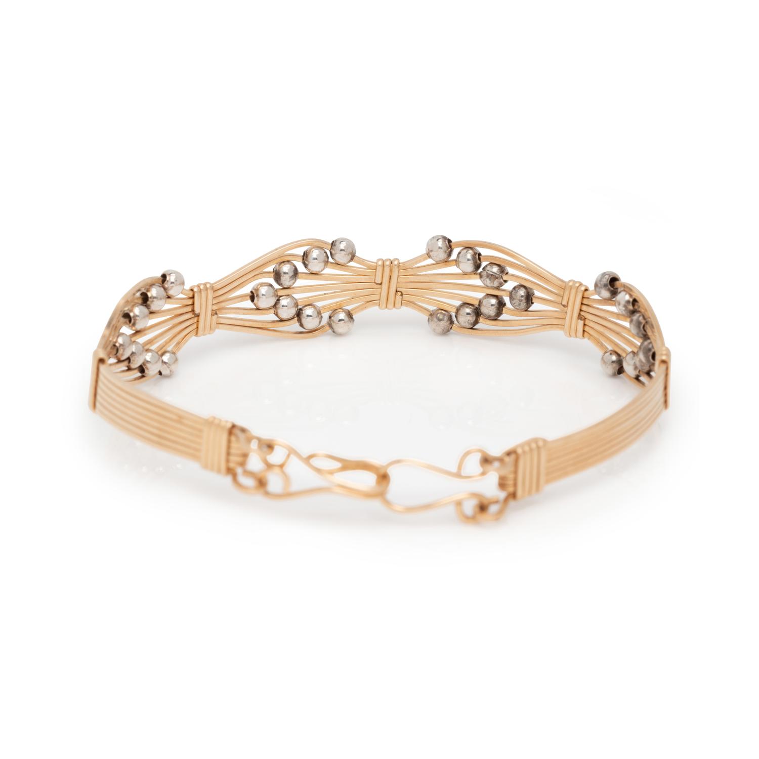 YELLOW GOLD AND SILVER BRACELET