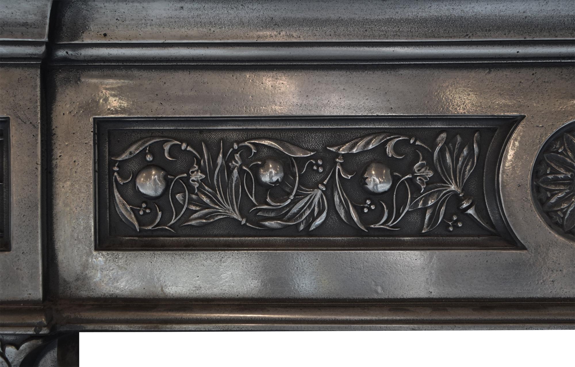 A Cast Iron Fireplace Mantel 58.5" W x 9" D x 53.5" H — England, Late 19th Century
