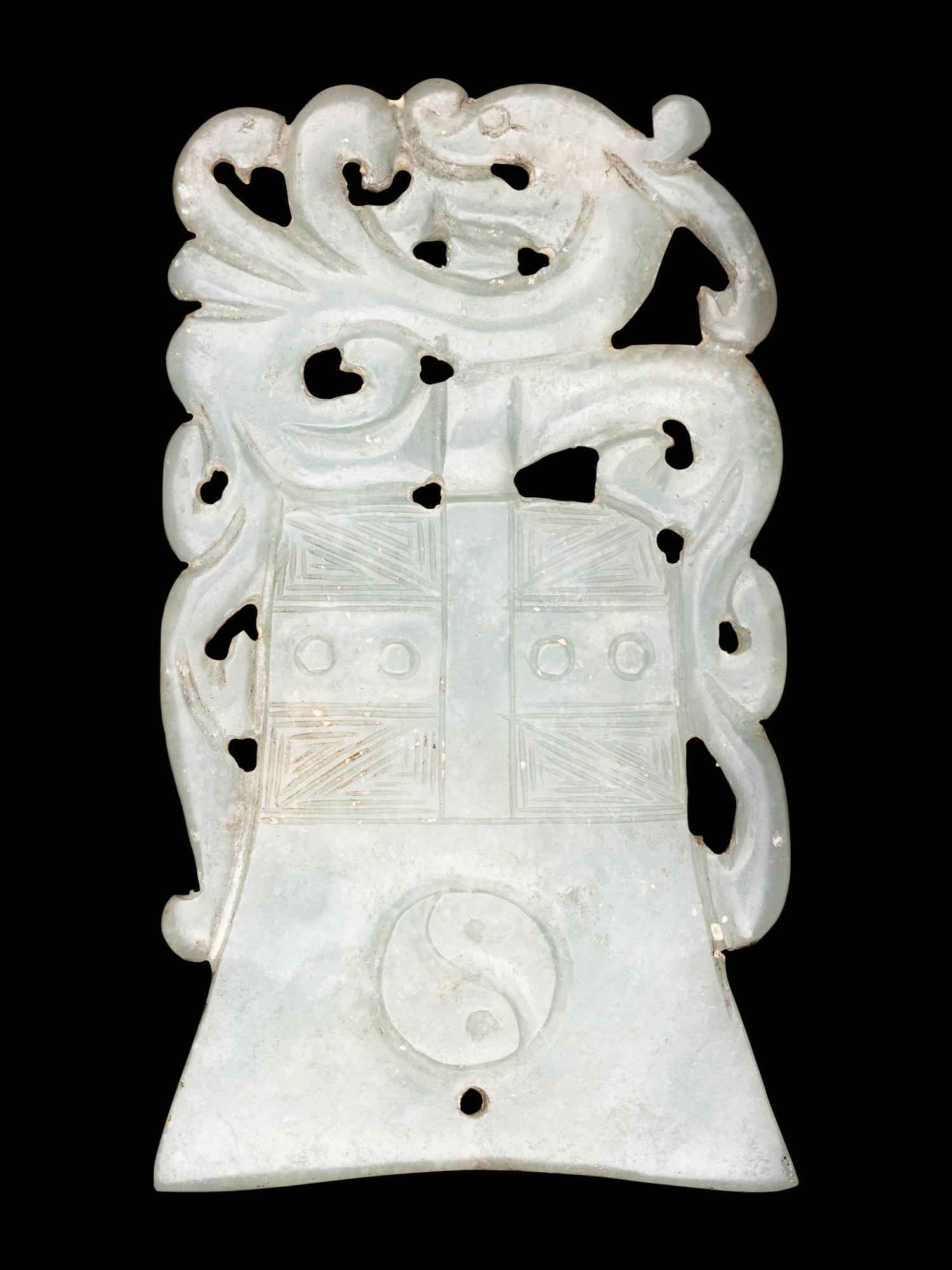 Two Celadon Jade Bell-Form Pendants